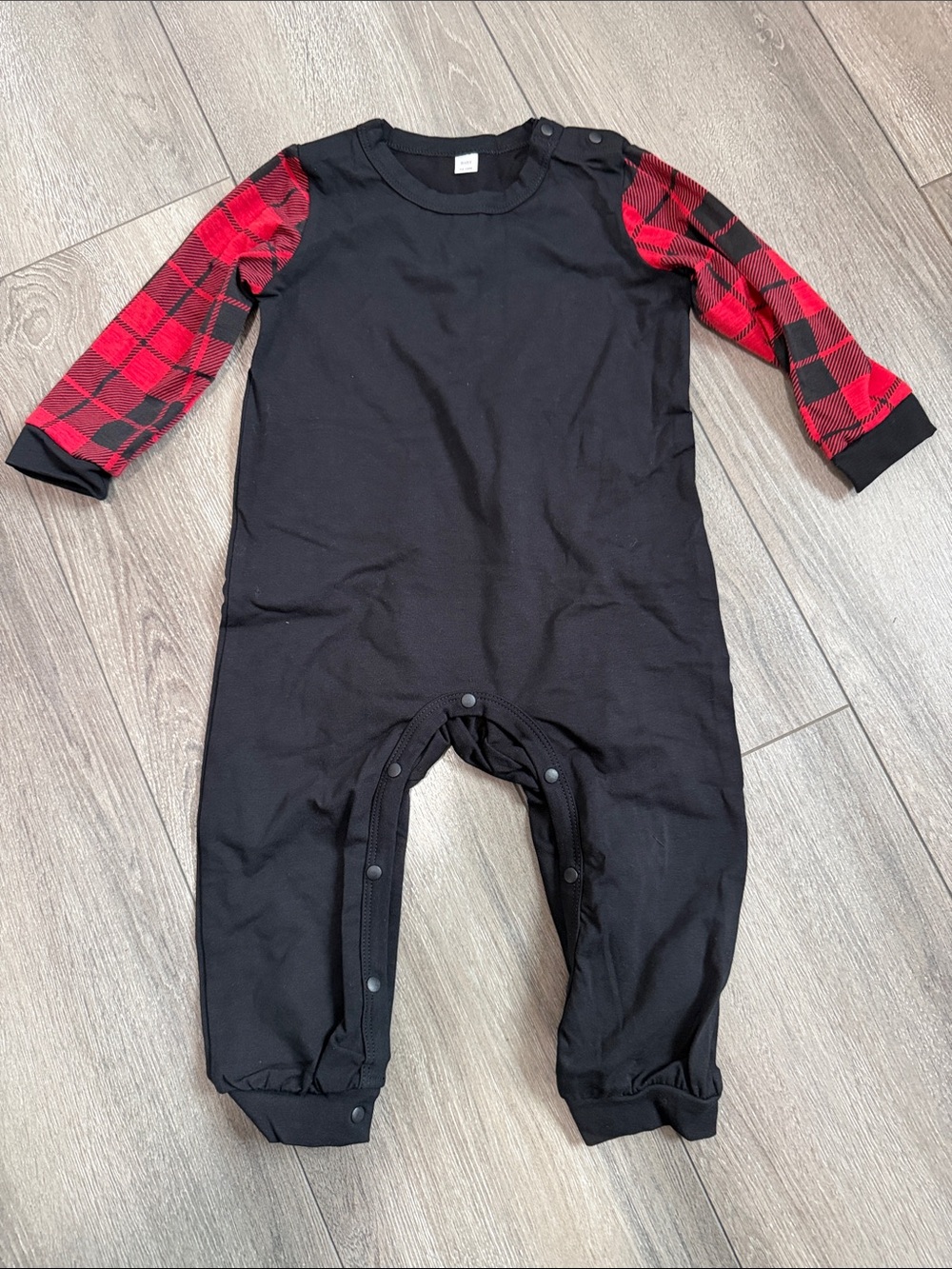 Kids Black One-Piece Bodysuit with Red Plaid Sleeves